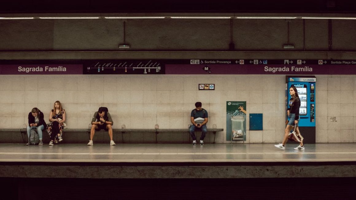 Commuters at Sagrada Familia station in Barcelona on a typical day.
