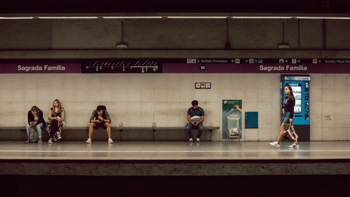 Commuters at Sagrada Familia station in Barcelona on a typical day.